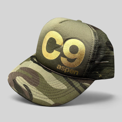Raree Finds vintage Cloud 9 Aspen olive trucker hat with camo brim, gold C9 logo, and rope detail on foam front.
