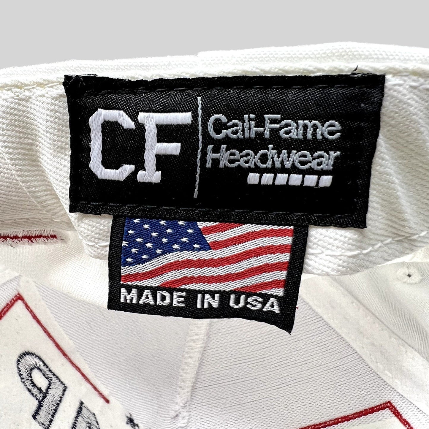 Raree Finds Cali Fame Headwear label inside a white Trump Vance 2024 snapback hat with Made in USA flag tag.