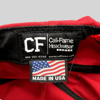Raree Finds official Cali-Fame Headwear Made in USA tag inside a red MAGA snapback hat
