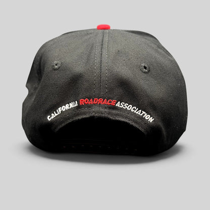 Raree Finds black snapback hat with California RoadRace Association embroidery on the back and a red top button