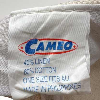 Raree Finds vintage Cameo snapback hat fabric care label showing 40 percent linen and 60 percent cotton composition