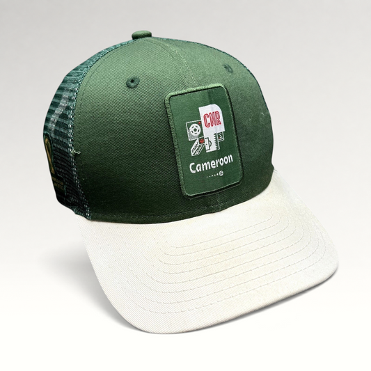 Raree Finds FIFA World Cup Qatar 2022 Cameroon CMR snapback trucker hat with green crown, white brim, and mesh back.