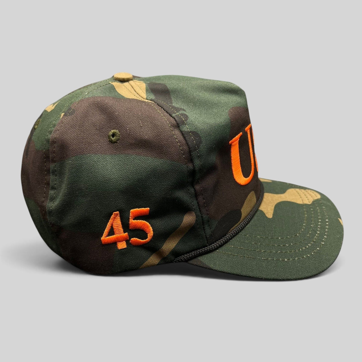 Raree Finds woodland camo snapback hat with orange 45 and USA embroidery and black rope detail on the brim
