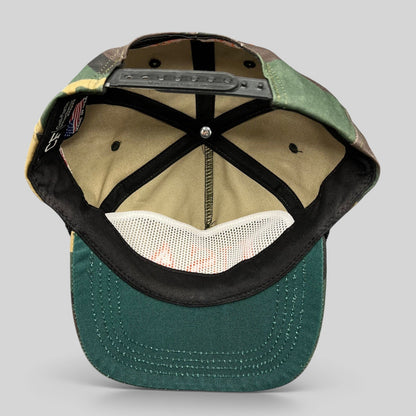 Raree Finds woodland camo snapback hat interior view showing black plastic snap closure and green brim underside
