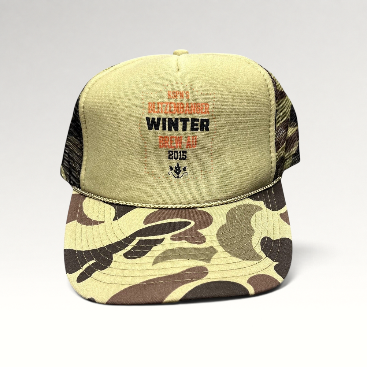 Raree Finds 2015 KSPN Blitzenbanger trucker hat with tan foam front, duck camo brim, and mesh back snapback closure.