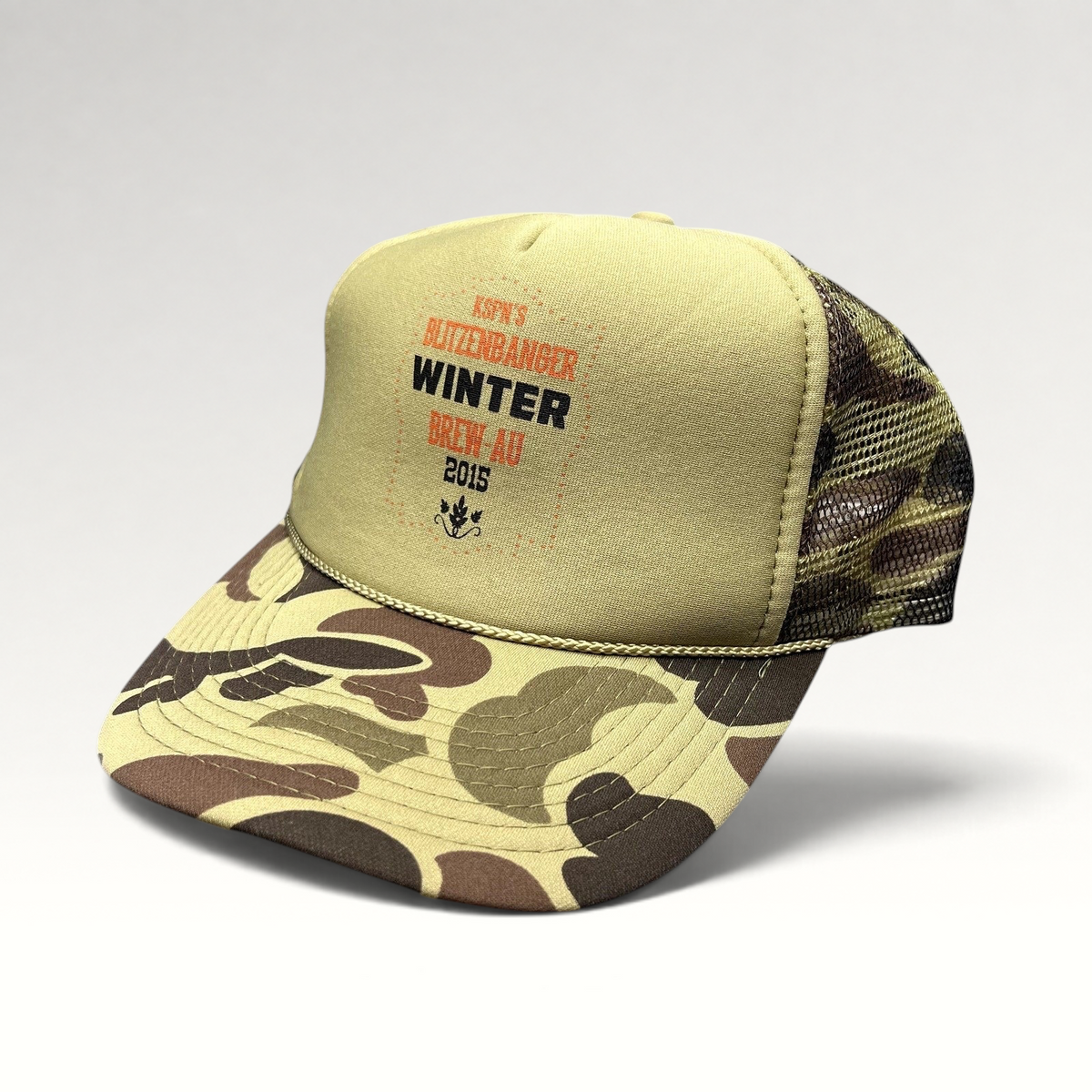 Raree Finds 2015 KSPN Blitzenbanger trucker hat with tan foam front, duck camo brim, and mesh back snapback closure.