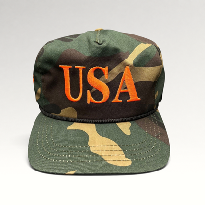 Raree Finds woodland camo snapback hat with orange USA embroidery and black rope detail on the brim