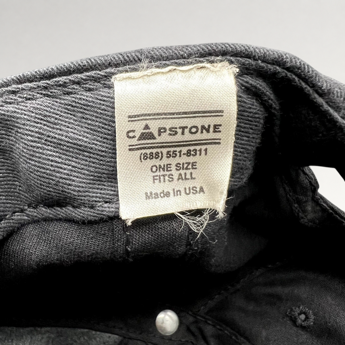 Raree Finds vintage Capstone hat interior tag showing Made in USA and one size fits all details