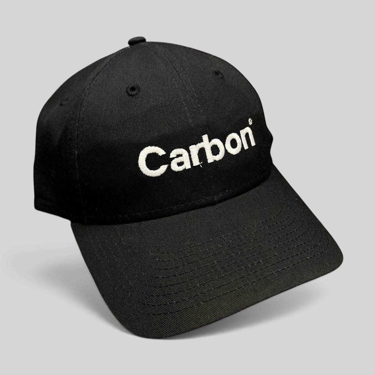 Raree Finds black New Era 9FORTY strapback hat with white embroidered Carbon 3D printing logo and curved brim