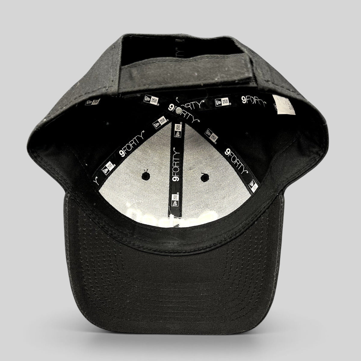 Raree Finds Carbon 3D Printing New Era 9FORTY black cotton strapback hat showing interior branding and adjustable strap