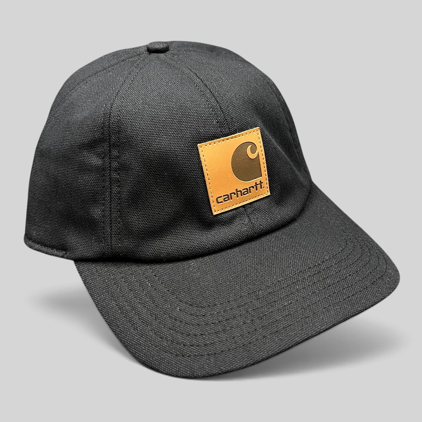 Raree Finds Carhartt black duck canvas workwear cap with a square logo patch on the front crown