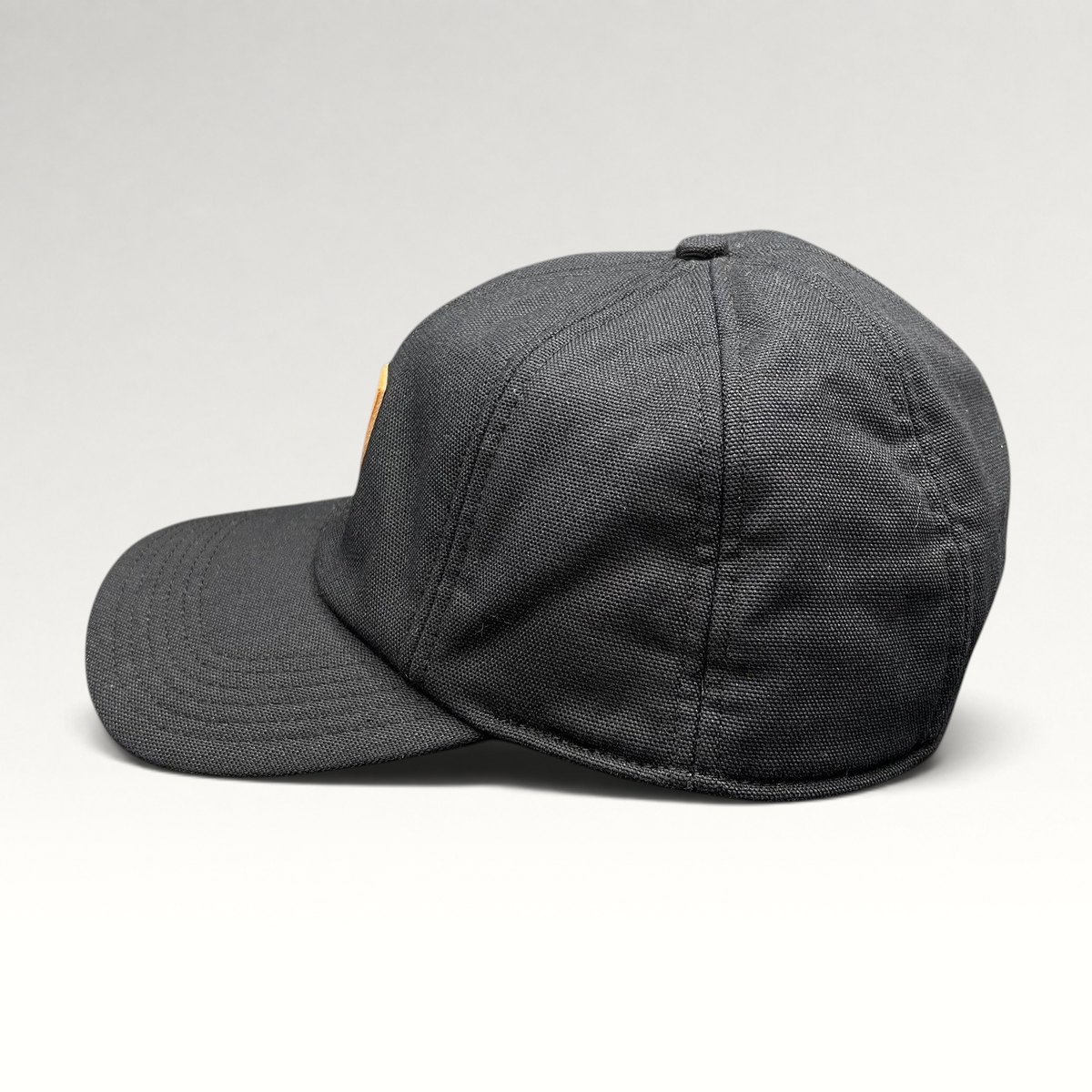 Raree Finds Carhartt black duck canvas ear flap cap with structured crown and side profile view
