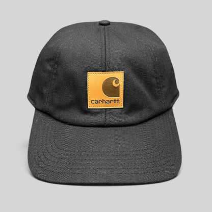 Raree Finds Carhartt black duck canvas workwear cap with a square logo patch and fold-down ear warmers.