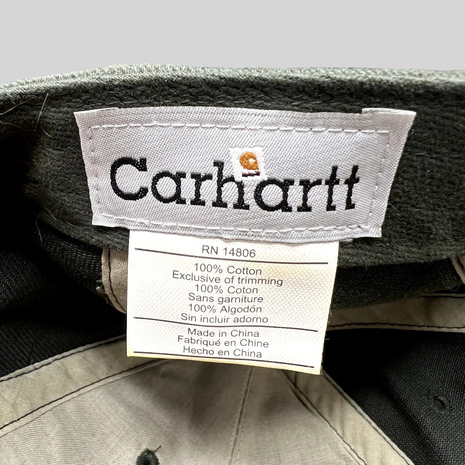 Raree Finds Carhartt cotton cap interior label showing 100% cotton material and branding details