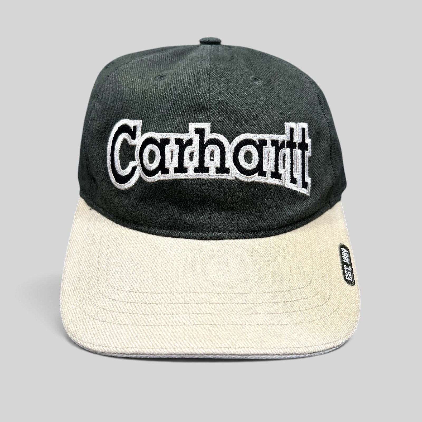 Raree Finds Carhartt two-tone black and khaki cotton strapback hat with white embroidered logo on the front