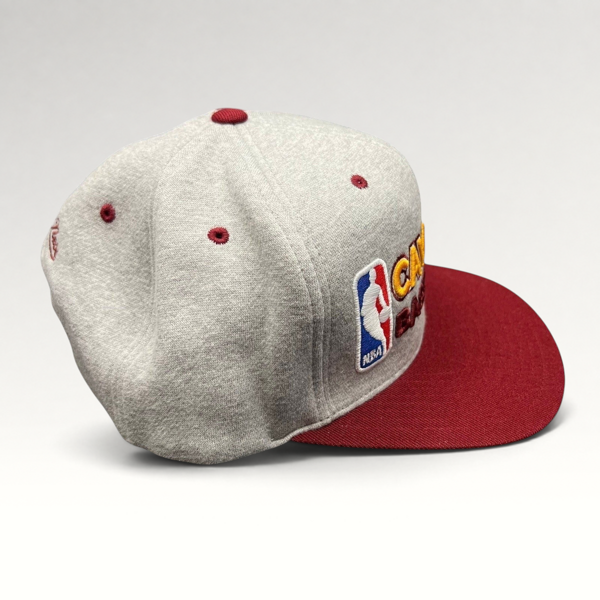 Raree Finds Mitchell & Ness Cleveland Cavaliers NBA snapback hat featuring a heather gray crown and wine red brim.