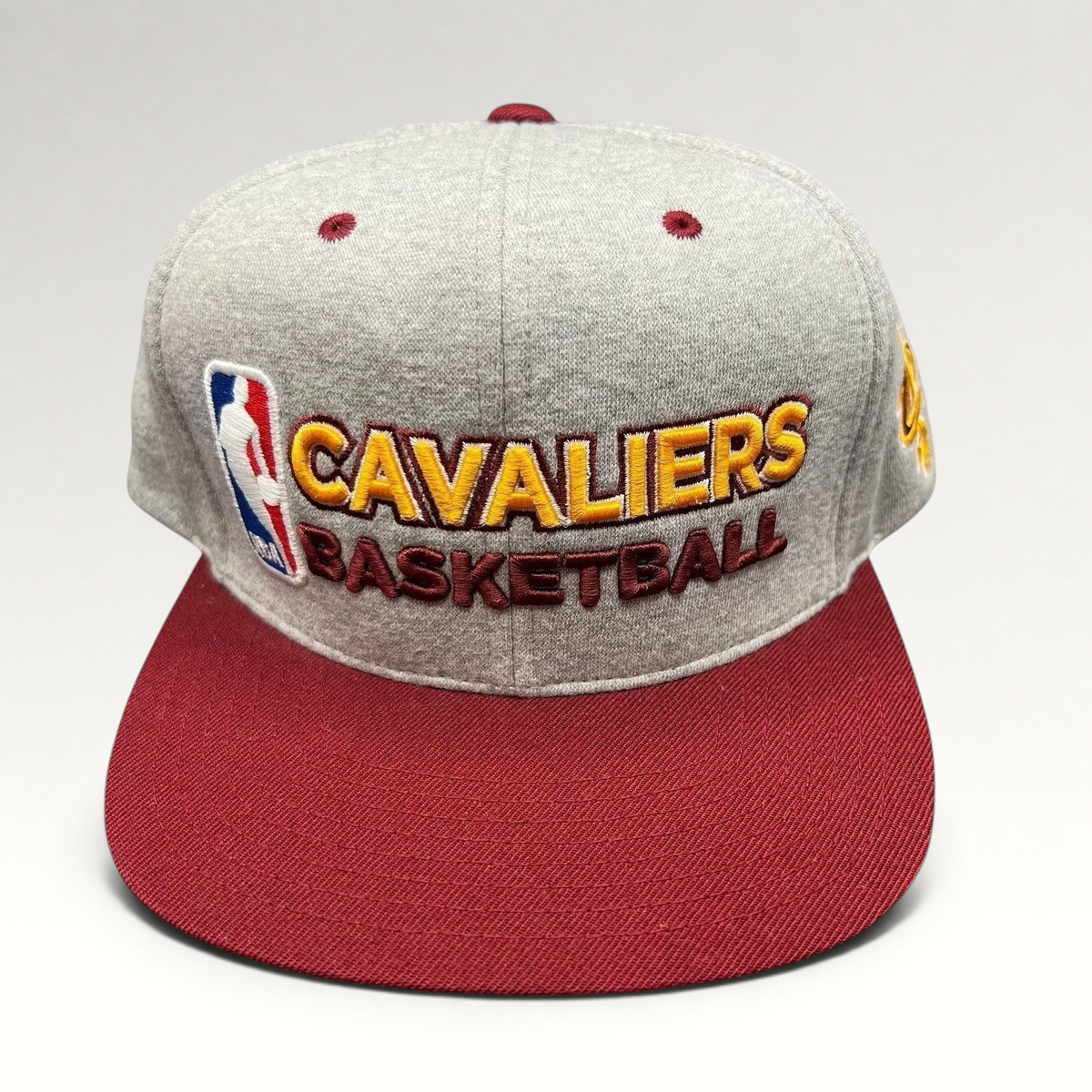 Raree Finds Mitchell & Ness Cleveland Cavaliers heather gray snapback hat with wine red brim and gold script embroidery