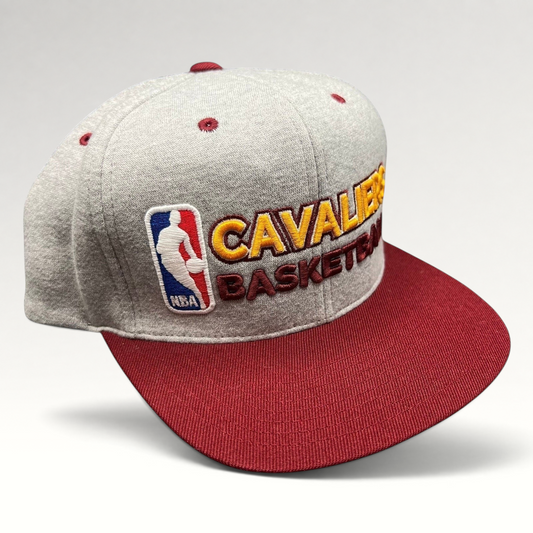 Raree Finds Mitchell & Ness Cleveland Cavaliers NBA snapback hat featuring a heather gray crown and wine red brim.