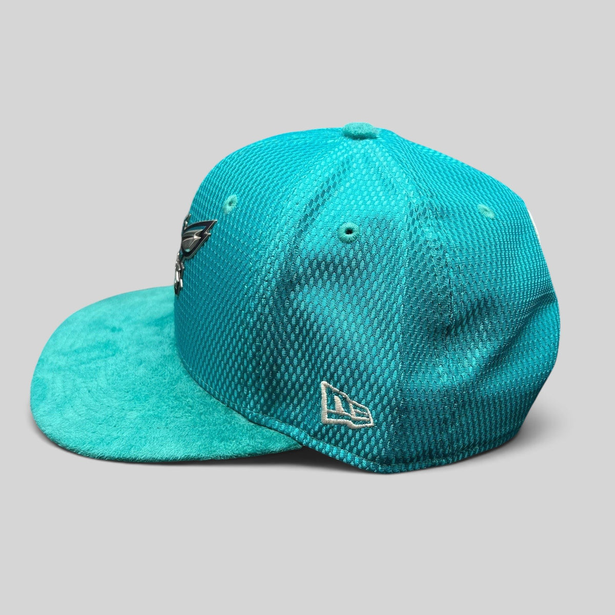 Raree Finds Charlotte Hornets New Era 9FIFTY teal snapback hat with textured performance fabric and suede-style brim.