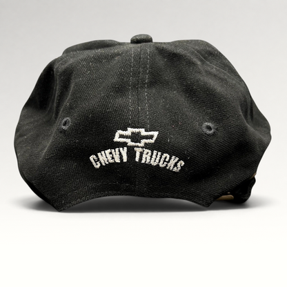 Raree Finds vintage black cotton strapback hat featuring white embroidered Chevy Trucks logo on the back panel.
