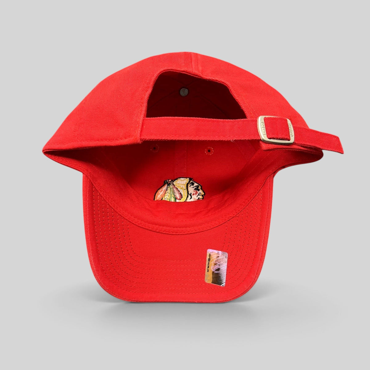 Raree Finds Chicago Blackhawks red cotton strapback hat by Reebok with embroidered team logo and metal slider buckle