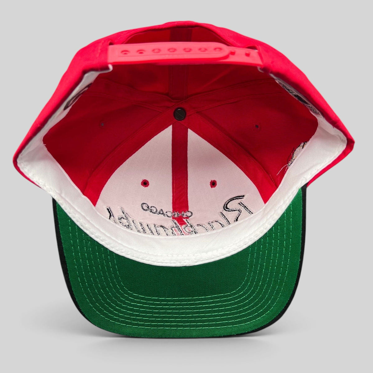 Raree Finds vintage 90s Chicago Blackhawks snapback hat interior showing green under-visor and adjustable strap