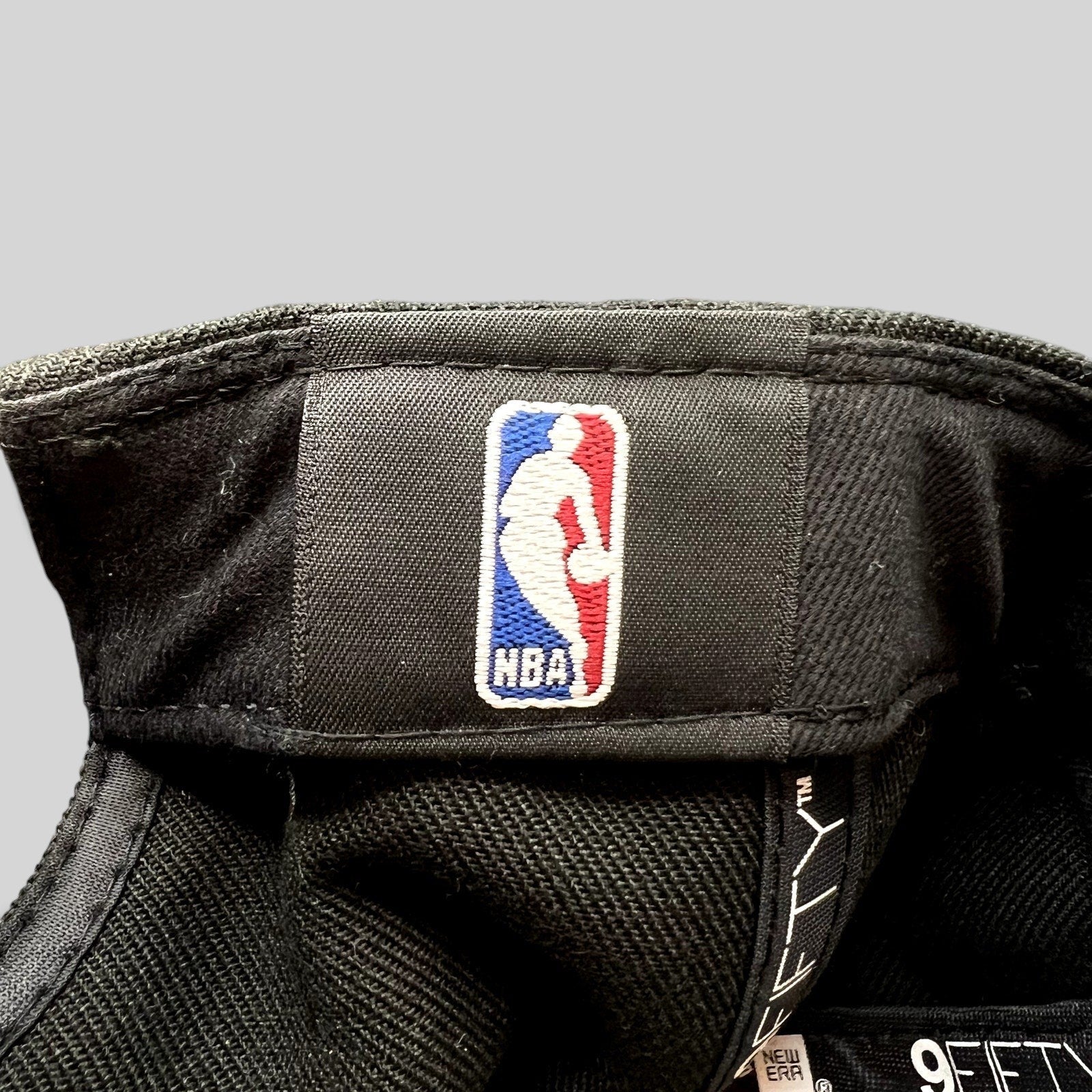 Raree Finds Chicago Bulls New Era 9FIFTY snapback interior showing the official NBA logo patch on the sweatband