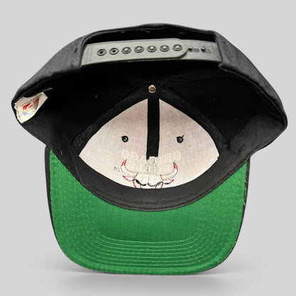 Raree Finds vintage 90s Chicago Bulls AJD snapback hat interior view showing green undervisor and black snap closure