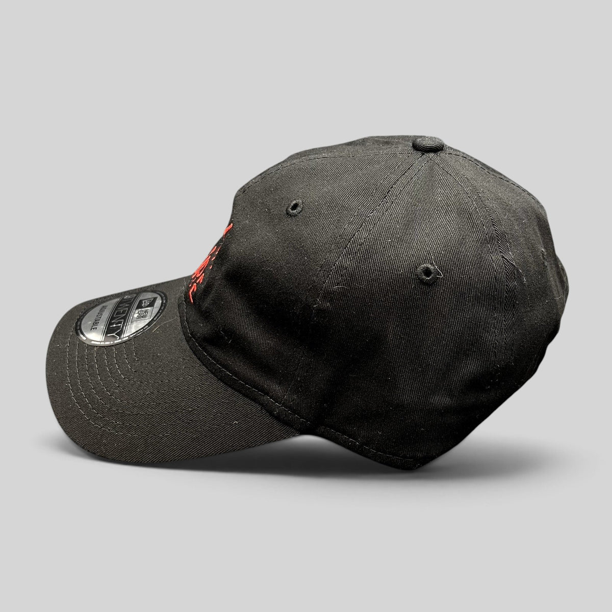 Raree Finds City On Fire season 1 cast and crew black New Era 9TWENTY strapback hat with red embroidery