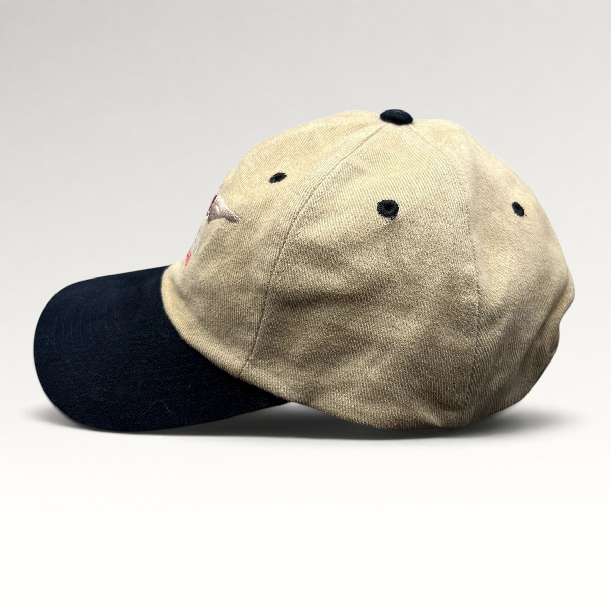 Raree Finds vintage Clay Lacy Aviation strapback cap with a tan cotton crown, black brim, and embroidered logo.