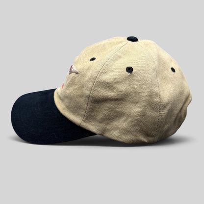 Raree Finds vintage Clay Lacy Aviation six-panel cap in tan cotton twill with a black brim and embroidered logo.