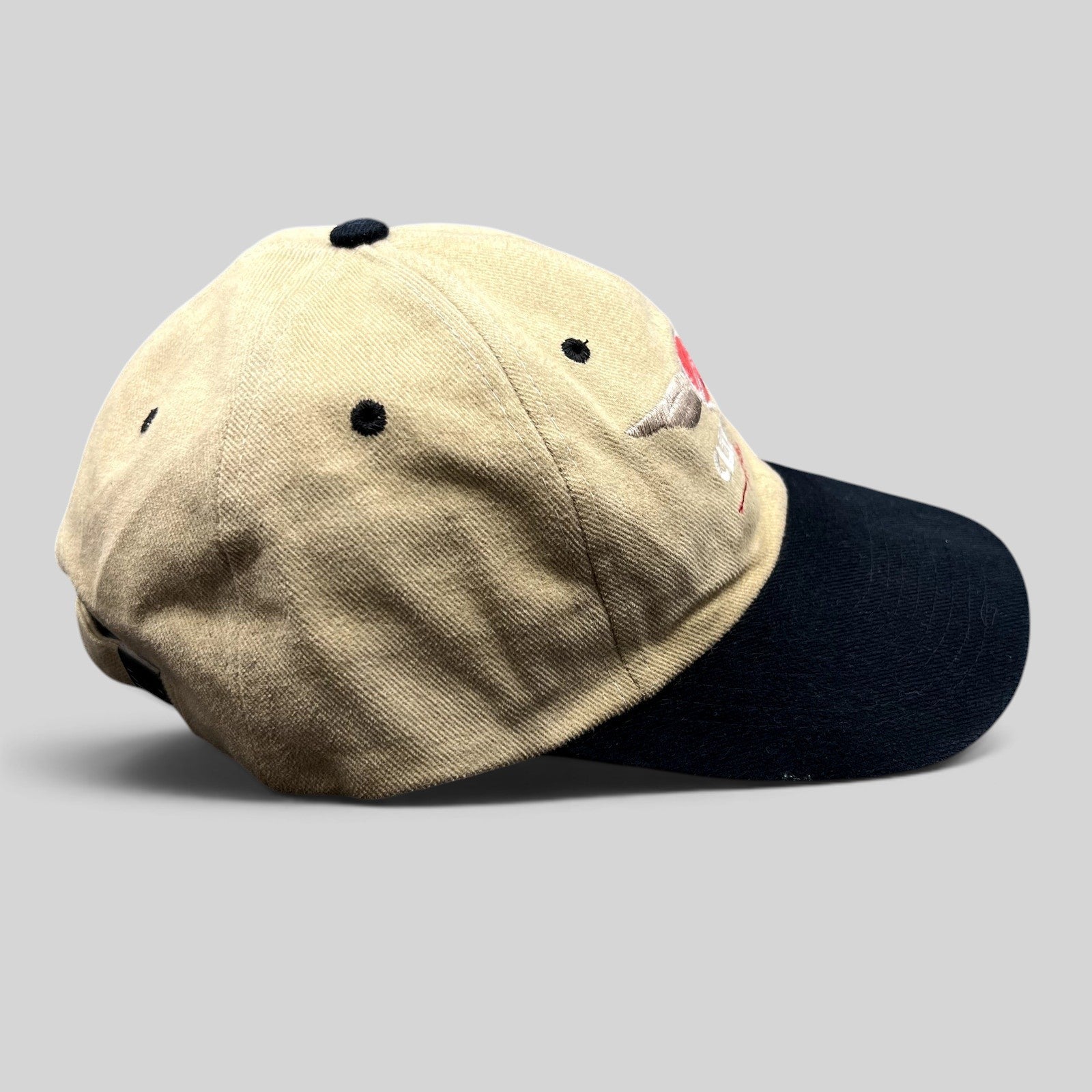 Raree Finds vintage Clay Lacy Aviation tan cotton cap with a black brim and embroidered winged logo side view