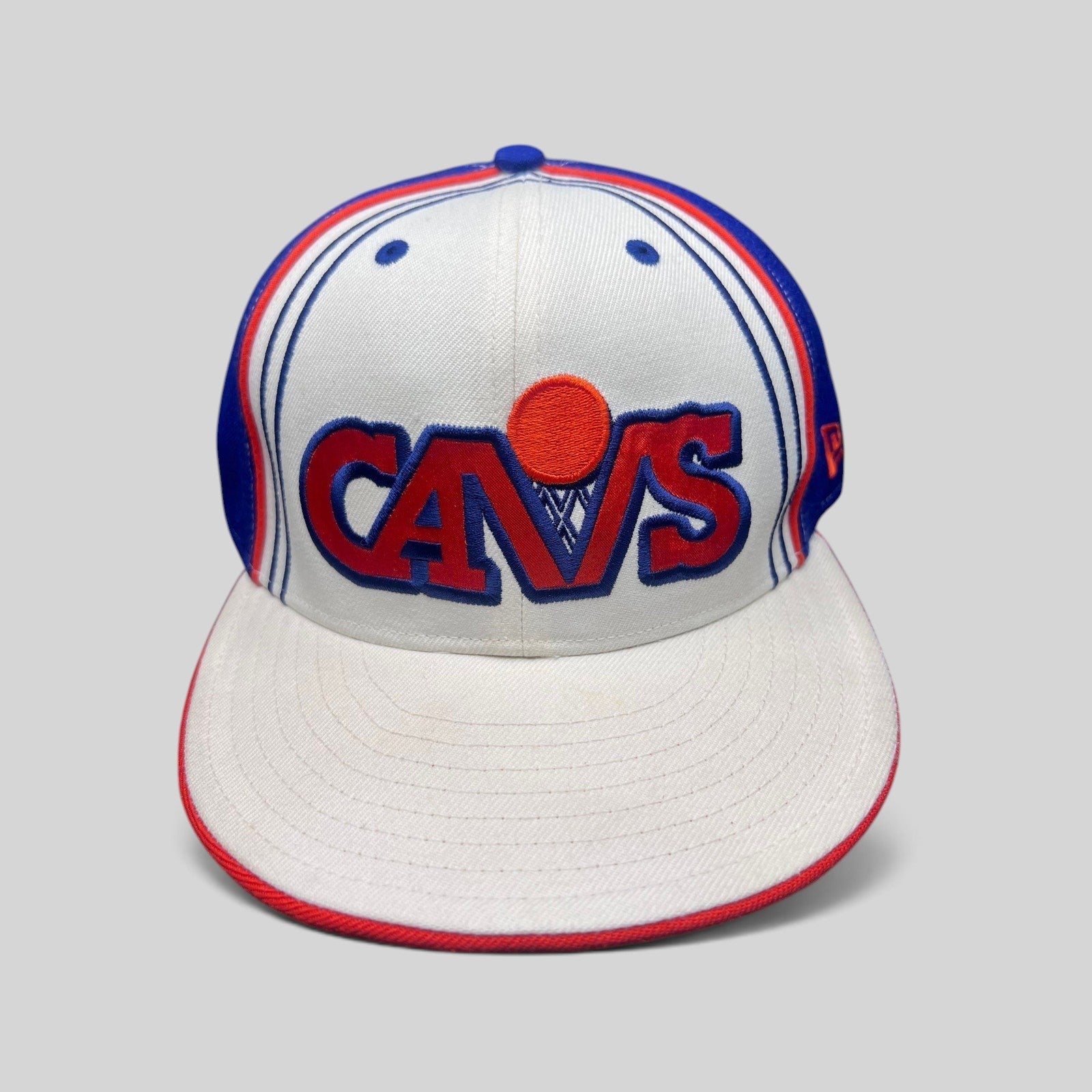 Raree Finds vintage Cleveland Cavaliers New Era 59FIFTY fitted hat with retro Cavs logo in white, blue, and orange.