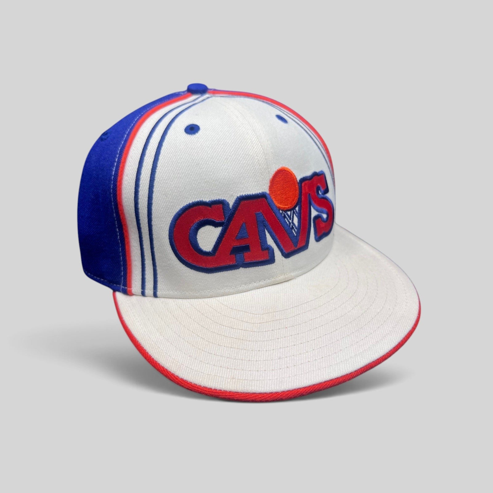Raree Finds vintage Cleveland Cavaliers New Era 59FIFTY fitted hat with retro logo, white, blue, and orange colors.