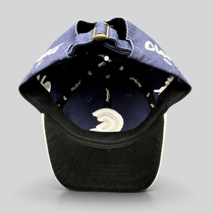 Raree Finds navy blue Cleveland Golf strapback hat interior view showing branded lining and adjustable brass buckle