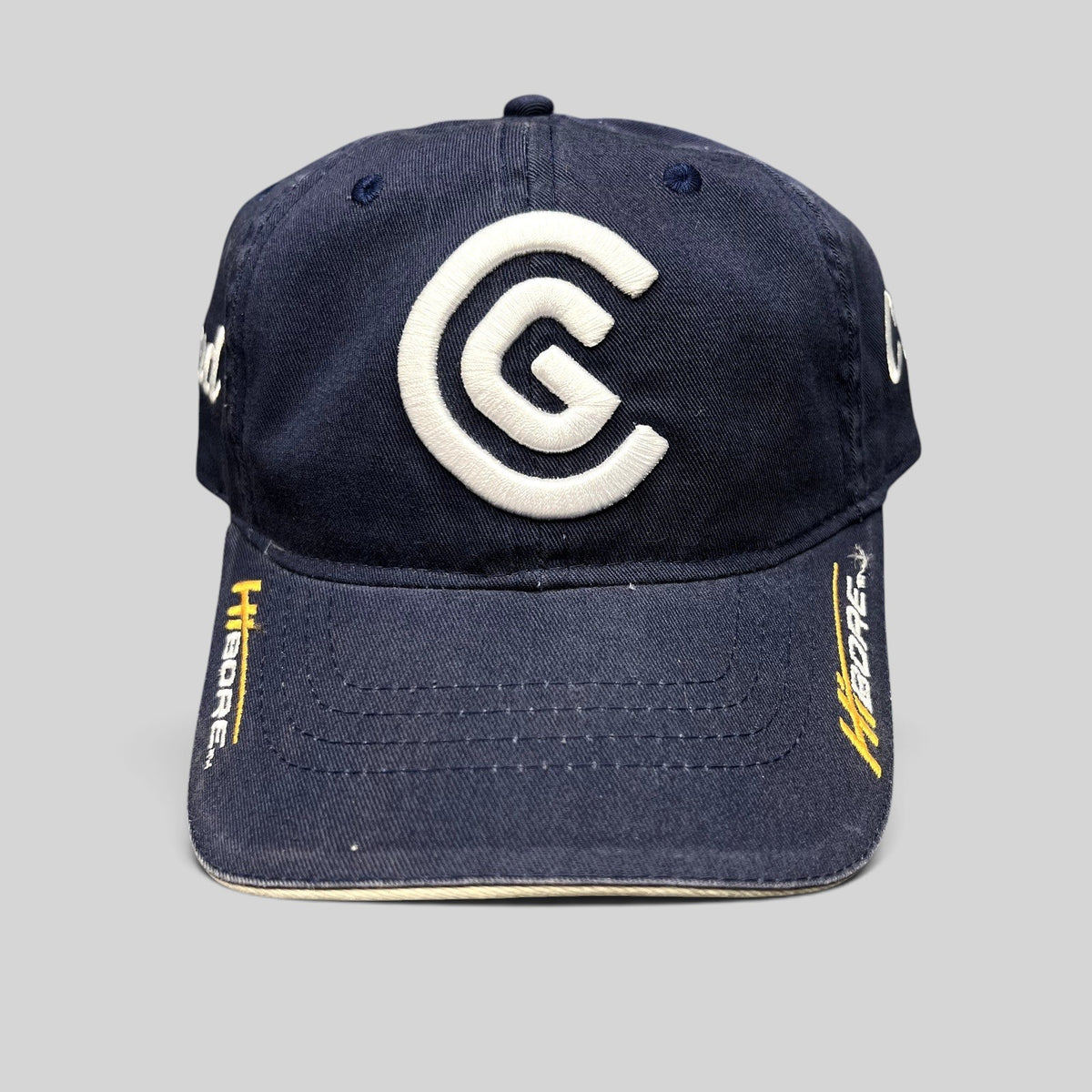 Raree Finds navy blue cotton twill Cleveland Golf strapback hat with white embroidered CG logo and HiBore brim detail