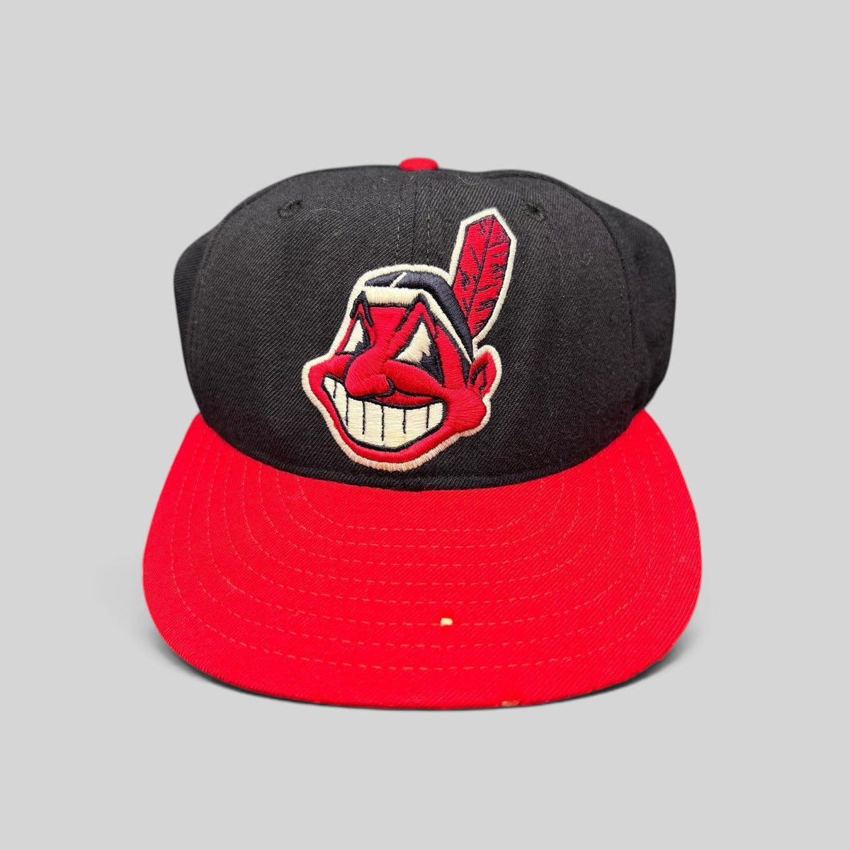 Raree Finds vintage New Era 59FIFTY Cleveland Indians wool fitted hat with embroidered Chief Wahoo logo