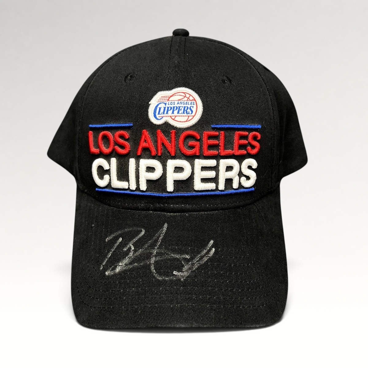 Raree Finds vintage Los Angeles Clippers black cotton strapback hat with embroidered team logo and signed brim.