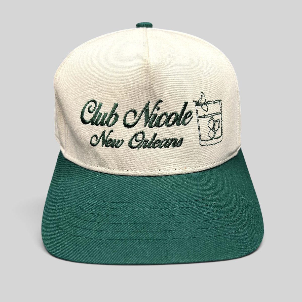 Raree Finds vintage Club Nicole New Orleans snapback hat with green script embroidery and cocktail graphic on cream