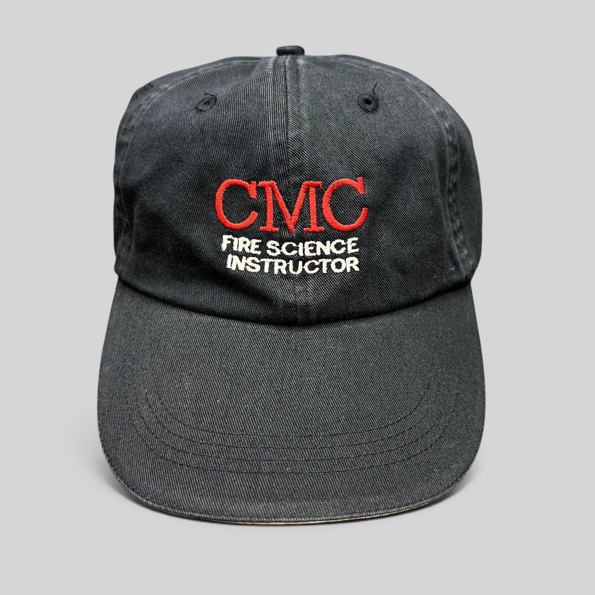 Raree Finds black cotton CMC Fire Science Instructor strapback hat with red and white embroidered front logo