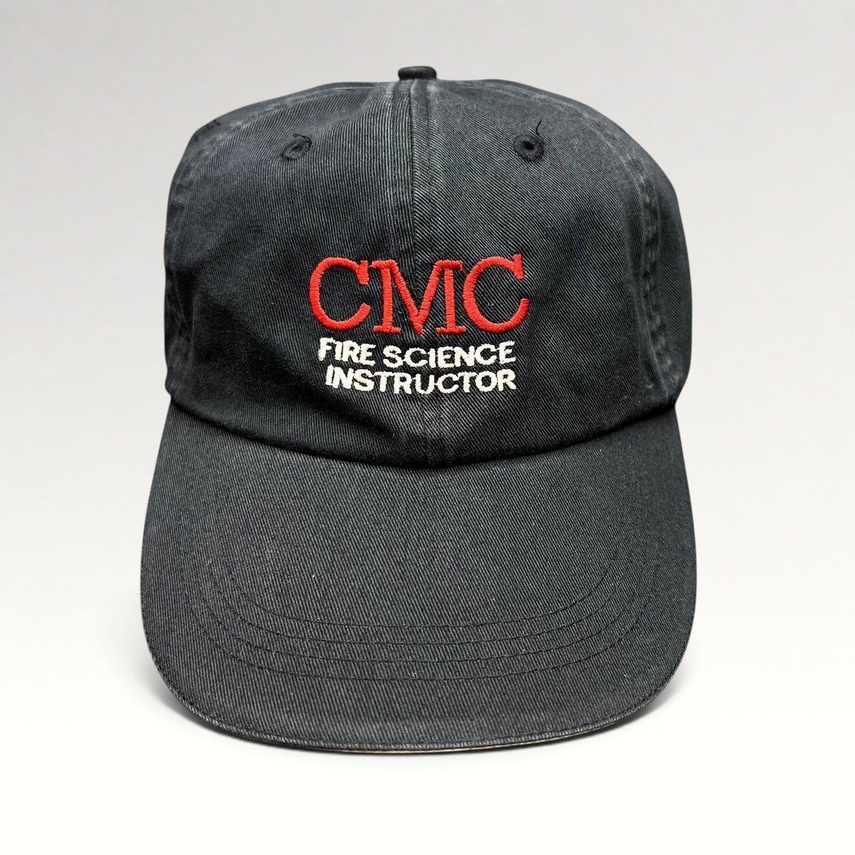 Raree Finds black cotton CMC Fire Science Instructor hat with red and white embroidered logo on the front
