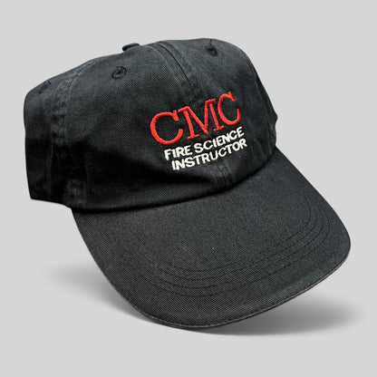 Raree Finds black cotton strapback hat with CMC Fire Science Instructor embroidery in red and white thread.