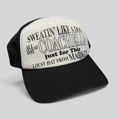 Raree Finds black and white Coachella x Market trucker hat with Sweatin Like a Dog graphic on foam front mesh back