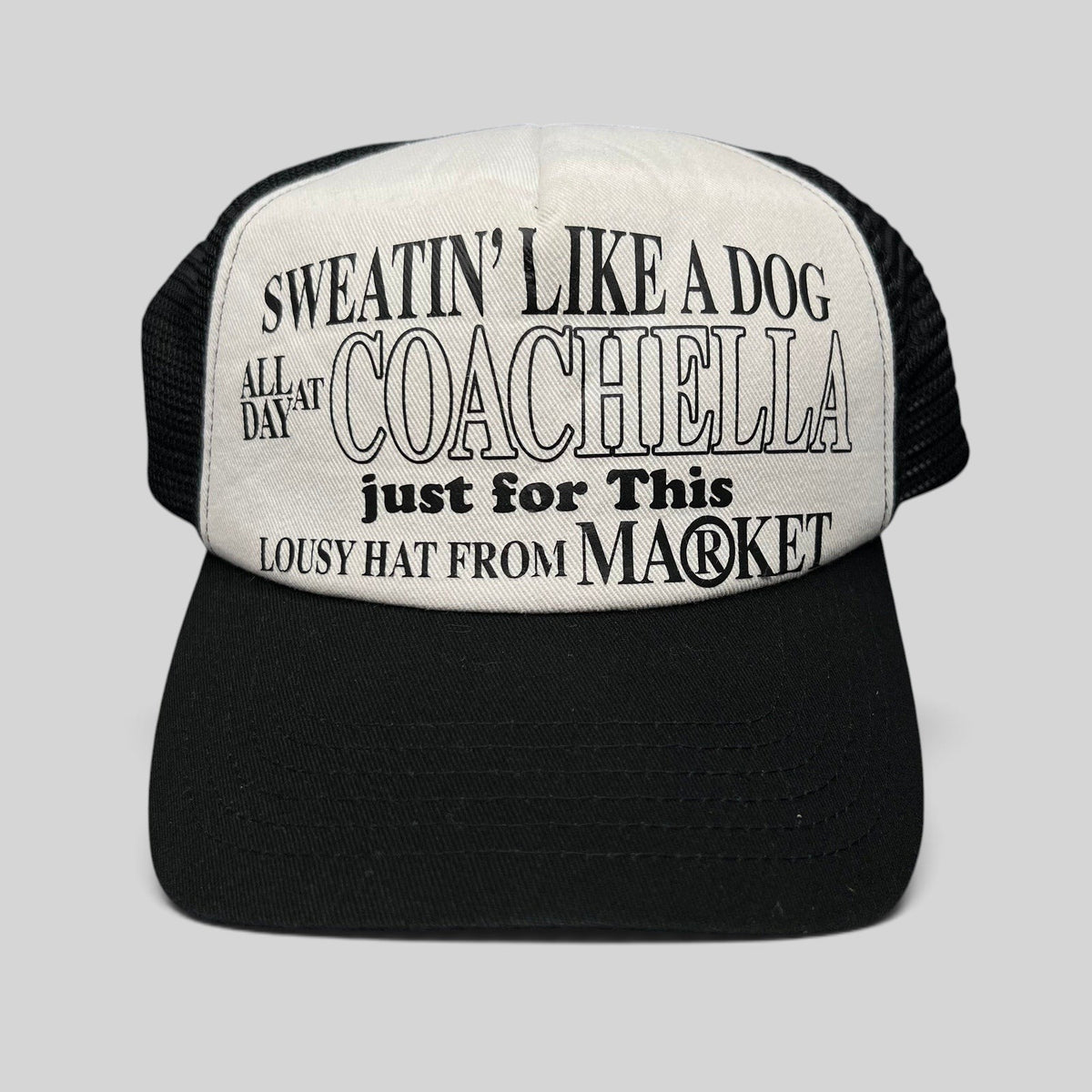 Raree Finds Coachella x Market black and white trucker hat with graphic text print on the foam front panel