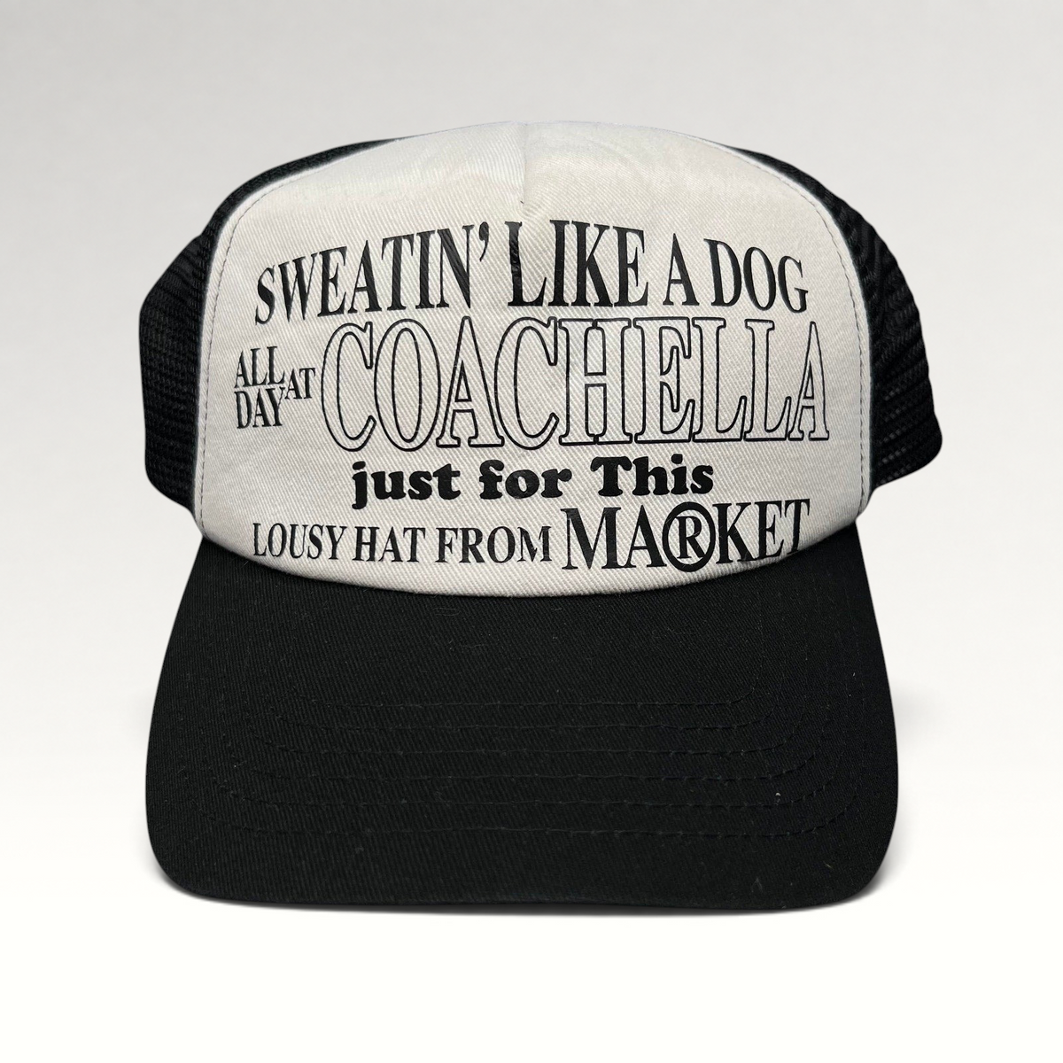 Raree Finds Coachella x Market black and white trucker hat with graphic text print on the foam front panel