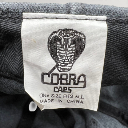 Raree Finds vintage 1998 Cobra Caps hat interior label showing brand logo and manufacturing details