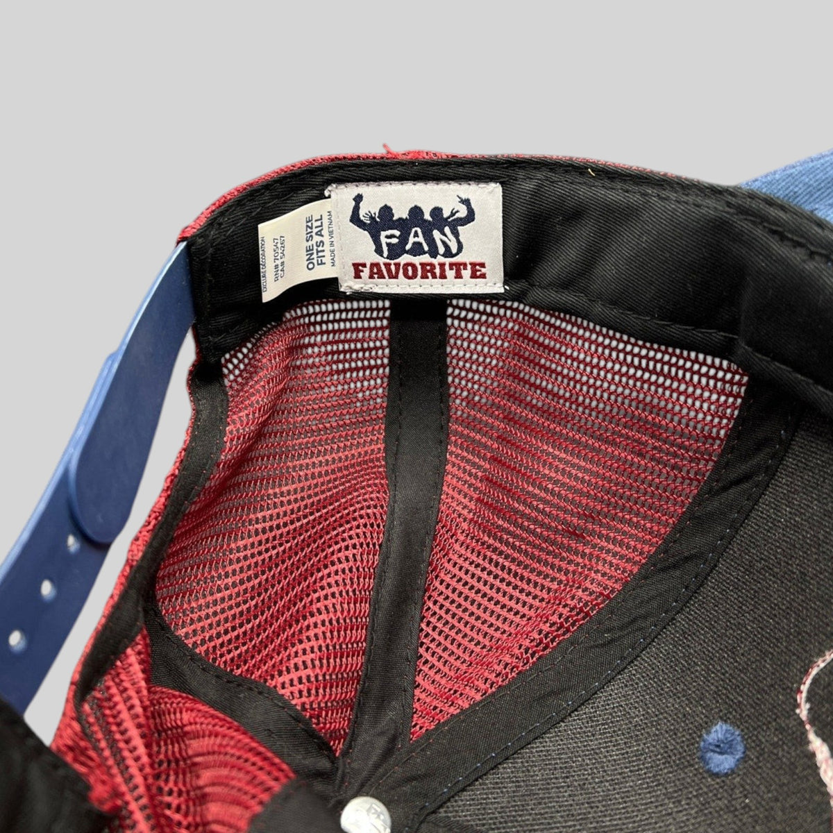 Raree Finds Colorado Avalanche trucker hat interior showing Fan Favorite brand label and maroon mesh back