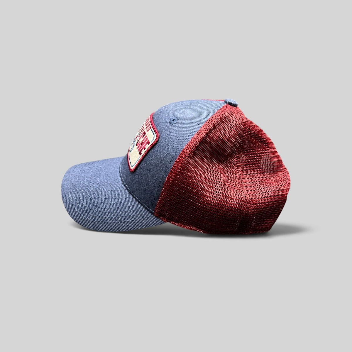 Raree Finds Colorado Avalanche NHL trucker snapback hat with blue crown, maroon mesh back, and embroidered logo patch
