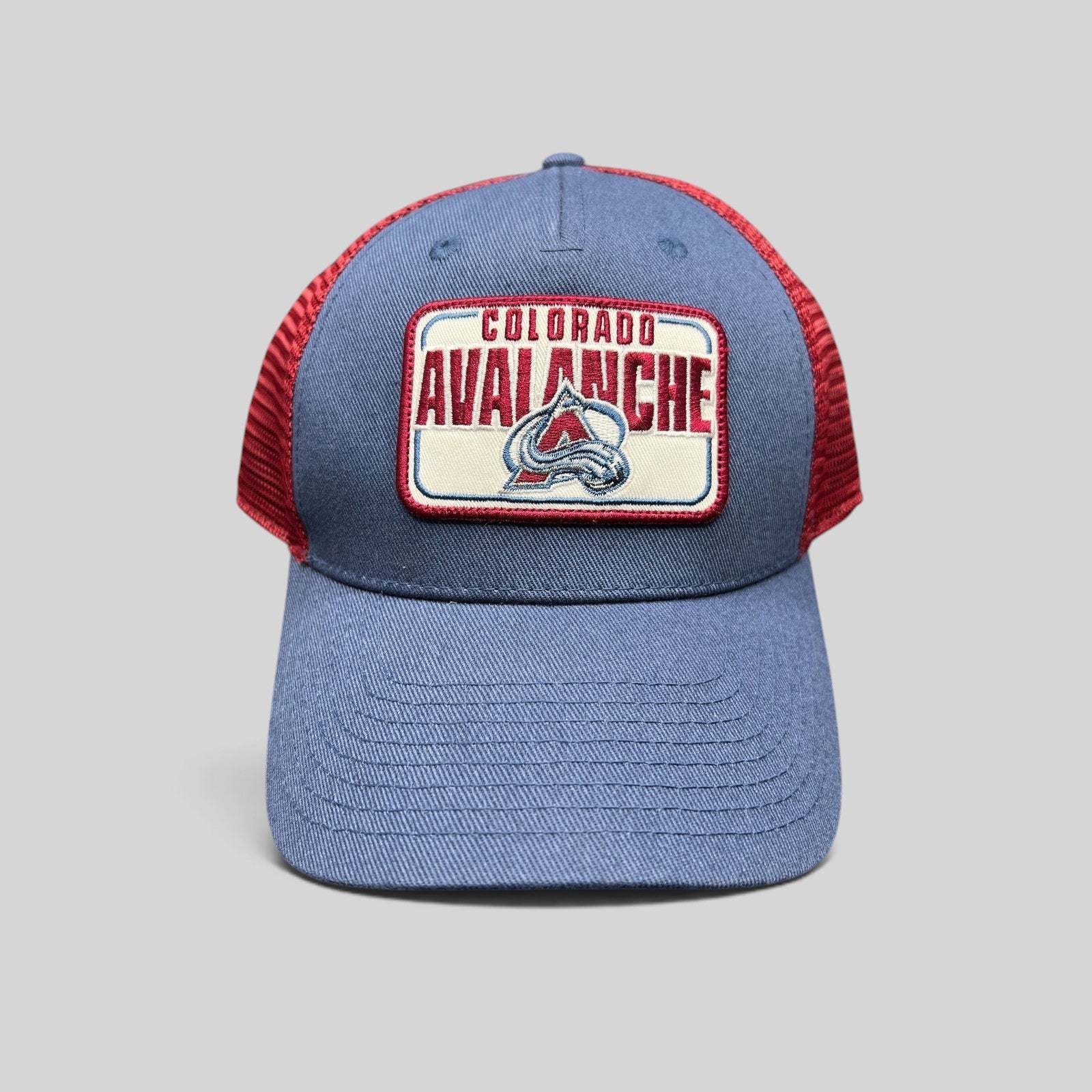 Raree Finds Colorado Avalanche NHL trucker snapback hat with blue cotton crown, maroon mesh back, and logo patch.