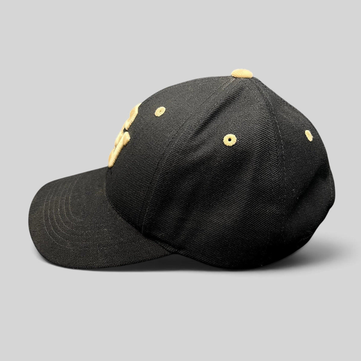 Raree Finds Colorado Buffaloes black strapback hat with metallic gold embroidered CU logo and matching gold eyelets.